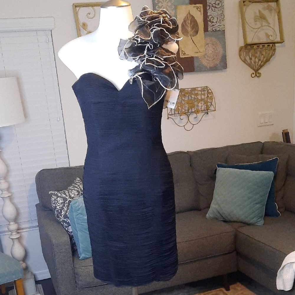 Elegant Black Strapless Dress with Floral Accent